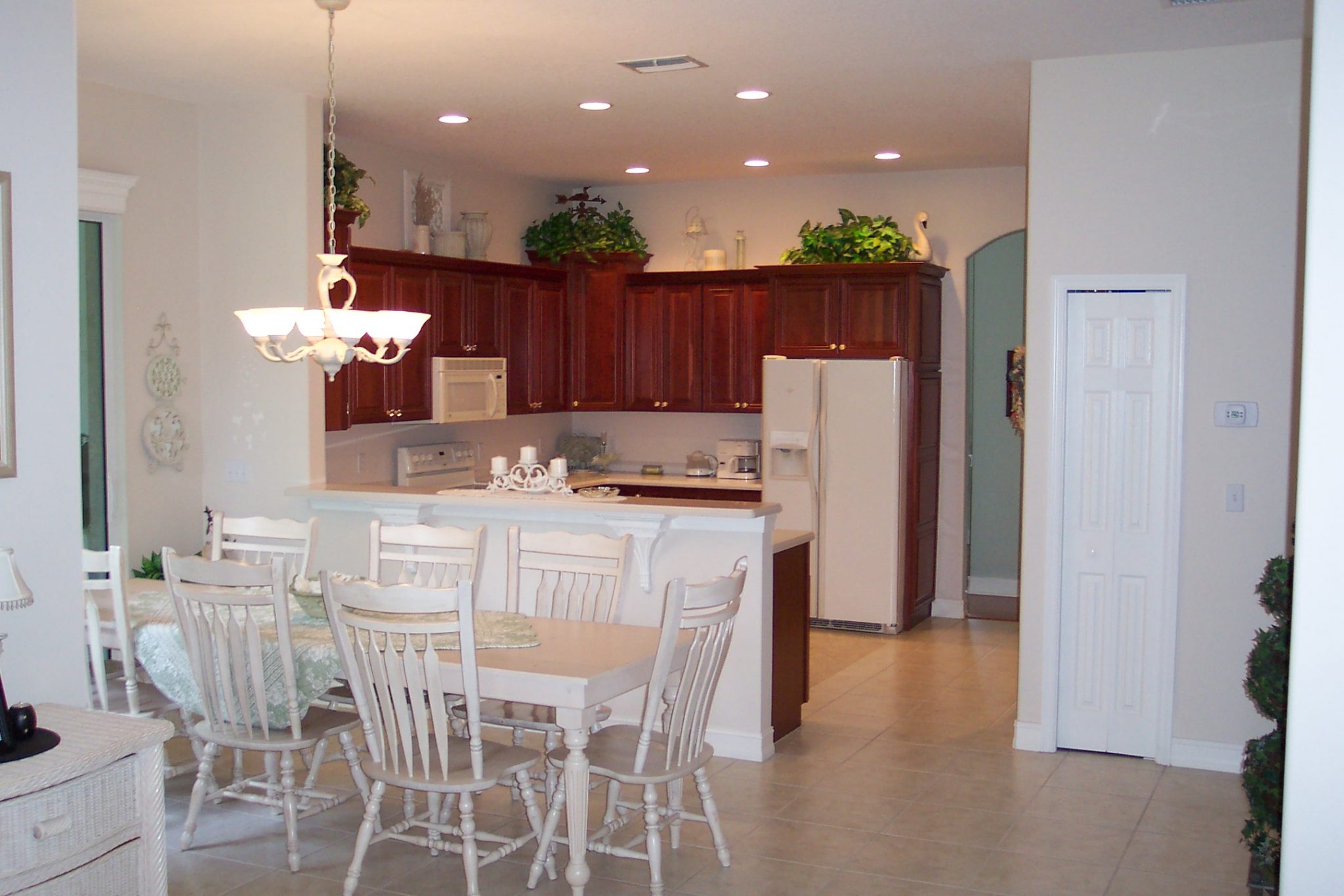 View of the Windsor main kitchen with breakfast nook in front.  The Windsor can offer up to 5 bedrooms for one family if desired.